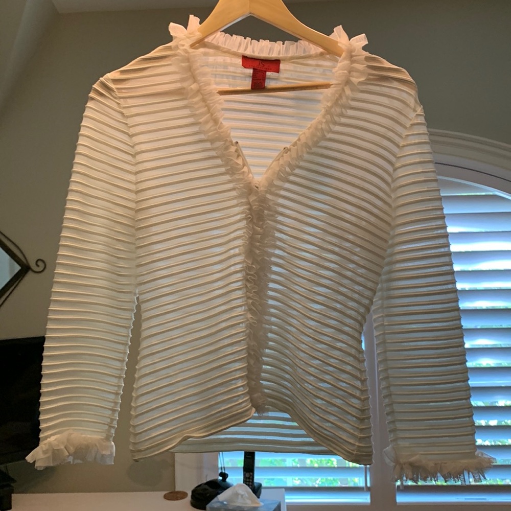 Stunning JS Collections elegant white zipperd top size 4.  Ruffled trim.